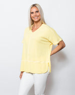 Snoskins Seersucker Knit V-Neck Body skimming with button detail at hip Matching thread Style 77585-24S