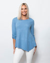 Snoskins Seersucker Knit V-Neck Body skimming with button detail at hip Matching thread Style 77585-24S